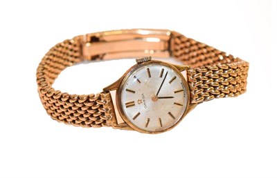 Lot 204 - A lady's 9 carat gold wristwatch signed Omega, bracelet clasp, hallmarked for 9 carat gold