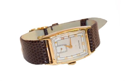 Lot 214 - A tonneau shaped 14k gold filled wristwatch, signed Hamilton