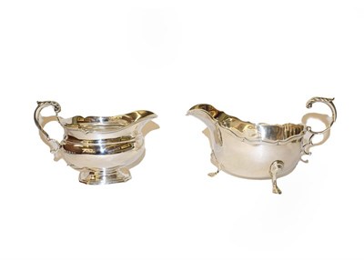 Lot 256 - Two differing George silver sauce boats, both by Ollivant and Botsford, one Sheffield, 1935,...