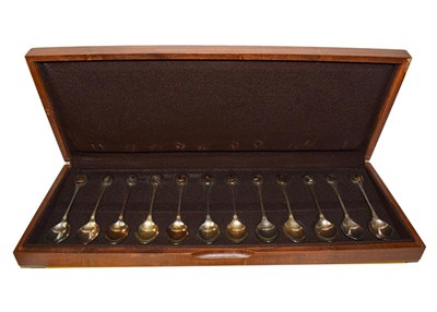 Lot 264 - A cased set of twelve Elizabeth II parcel gilt silver teaspoons, by John Pinches, London, 1975,...