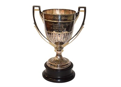 Lot 268 - A George V silver trophy cup, by Henry Atkin, Sheffield, 1926, tapering cylindrical and on...