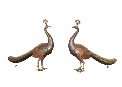 Lot 277 - A large pair of Indian Bidriware sculptures formed as peacocks, chased and with coloured...