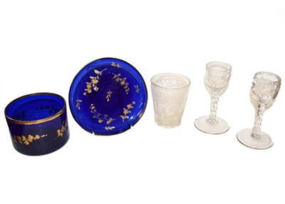 Lot 285 - An 19th century Bristol blue glass finger bowl on stand with gilt decoration together with a...