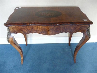 Lot 1640 - A Victorian Figured Walnut, Tulipwood and Floral Marquetry Foldover Card Table, late 19th...