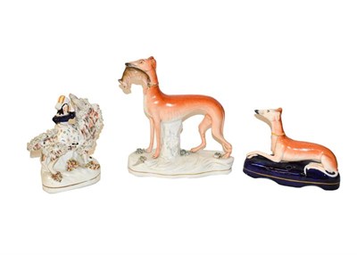 Lot 286 - A large quantity of Staffordshire pottery figures including equestrian examples, spaniels,...