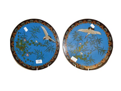 Lot 292 - A pair of Japanese Meiji period cloisonne chargers, with blue ground decorated with cranes and...