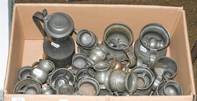 Lot 314 - A quantity of 19th century pewter measures and a flagon (one box)