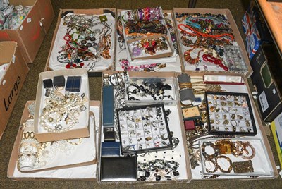 Lot 328 - A large quantity of assorted costume jewellery (ten trays of various sizes)