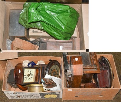 Lot 334 - A selection of clocks including two postman's alarm wall clocks, two striking mantel clocks,...