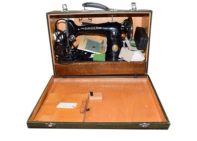 Lot 339 - A Singer treadle sewing machine