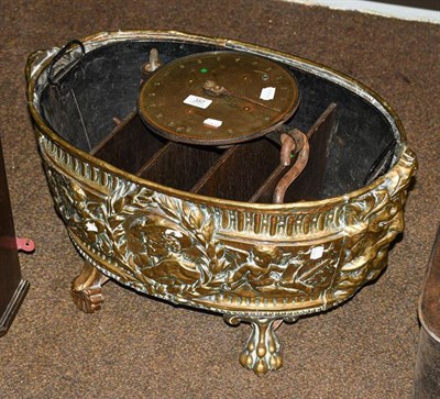 Lot 357 - A Salters spring balance and an embossed brass planter of ovoid form, later fitted, 60cm wide (2)