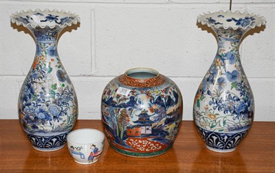 Lot 373 - A pair of Japanese Imari vases with frilled rims, 36cm high, together with a Chinese provincial...