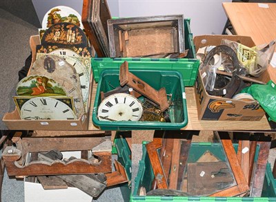 Lot 394 - A quantity of clock case mouldings including, clock seat boards, wooden wall clock dial and...