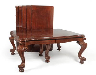 Lot 1653 - An Impressive Early Victorian Mahogany Wind-Out Dining Table, circa 1840, the serpentine shaped top