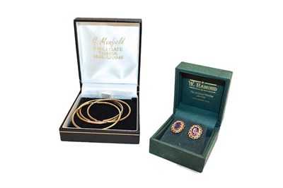 Lot 204A - A pair of earrings, a pair of hoop earrings with clasp stamped 375, and another pair of hoop...