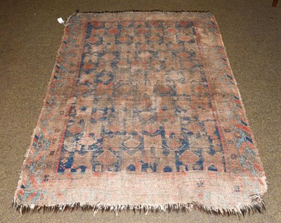 Lot 1007 - An Afshar rug, the indigo field with columns of geometric devices enclosed by serrated leaf and...