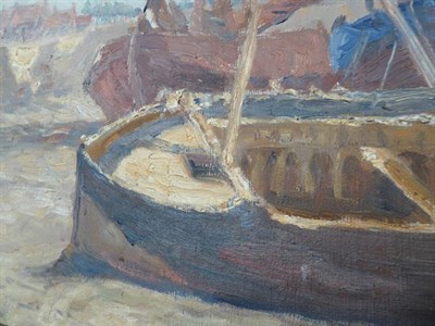 Lot 1031 - Dutch school (20th century) Boats on the shore, oil on canvas, indistinctly signed, 39cm by 59cm