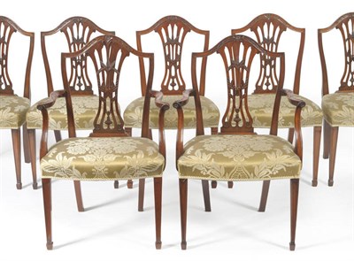 Lot 1663 - A Matched Set of Twelve Hepplewhite Style Dining Chairs, late 19th century, with curved top...