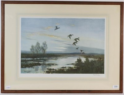 Lot 1099 - Peter Scott (1909-1989) Swans flying over a landscape, signed print, 38.5cm by 55.5cm, together...