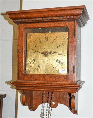 Lot 1136 - An oak thirty hour alarm wall clock, the square brass dial signed Mary Quarman, Temple Cloud,...
