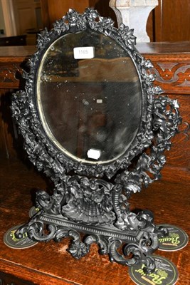 Lot 1165 - A Victorian cast iron table mirror, 38cm by 50cm