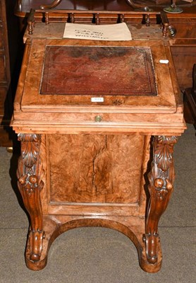Lot 1173 - A Victorian burr walnut Davenport with crimson leather writing surface and satinwood interior, with