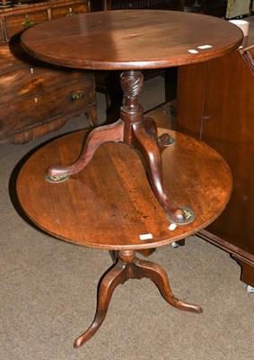 Lot 1178 - A George III oak centre pedestal snap top table, 83cm diameter; together with a similar George...