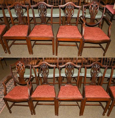 Lot 1187 - A set of eight carved mahogany Hepplewhite style dining chairs, including a pair of carver...