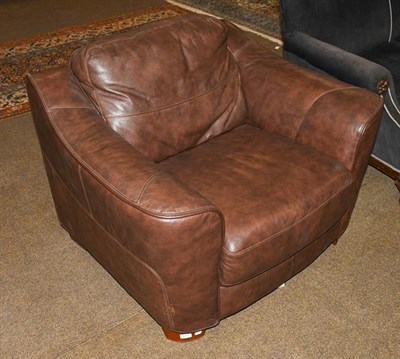 Lot 1197 - A modern brown leather armchair, 108cm by 86cm by 70cm