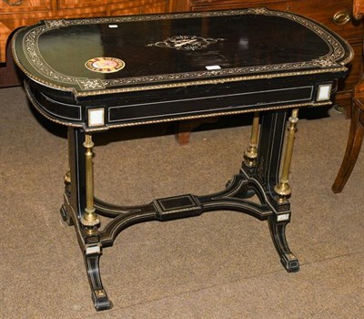 Lot 1209 - A Victorian ebonised and bone inlaid foldover card table, with gilt metal mounts set with...