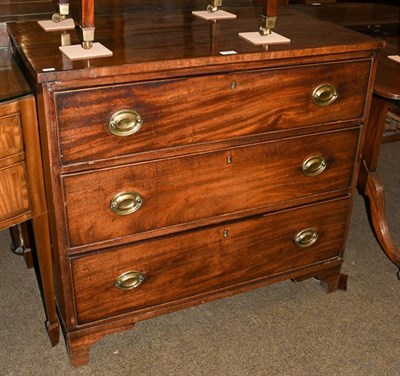 Lot 1213 - A George III mahogany three drawer chest on bracket feet, 91cm by 52cm by 85cm