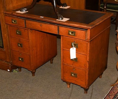 Lot 1223 - A Victorian mahogany ships pedestal desk, arrangement of seven drawers, inset handles, split...