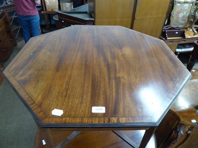 Lot 1228 - A Victorian mahogany octagonal window table, crossbanded with strung inlay and raised on square...