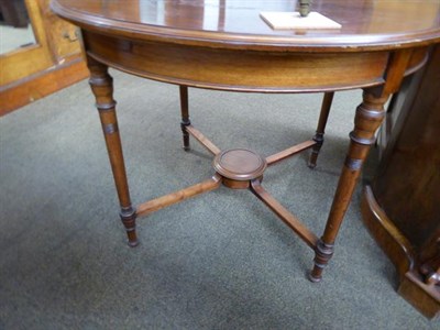 Lot 1228 - A Victorian mahogany octagonal window table, crossbanded with strung inlay and raised on square...