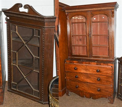 Lot 1244 - A Victorian mahogany glazed bookcase, 114cm by 30cm by 122cm, an associated mahogany three...