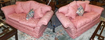 Lot 1267 - A pair of Duresta sofas with pink damask upholstery and scatter cushions, approximately 188cm...