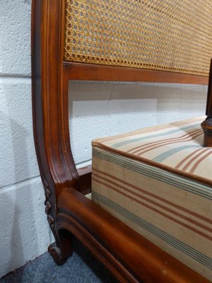 Lot 1284 - A reproduction French cane king size double bedstead, overall 222cm by 193cm by 110cm