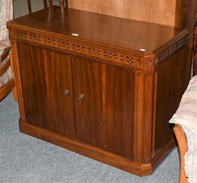 Lot 1297 - A mahogany blind fret carved cabinet, 100cm by 45cm by 75cm