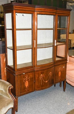 Lot 1311 - An Edwardian inlaid mahogany bow front display cabinet, 137cm by 40cm by 188cm