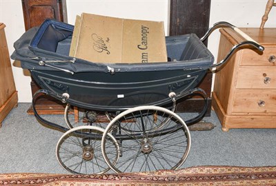 Lot 1331 - The London Baby Coach, a large vintage pram, with pram canopy, overall length approximately 150cm