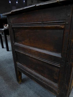 Lot 1339 - A 17th century oak coffer monogrammed M.L and dated 1682 (a.f.), 126cm by 57cm by 75cm