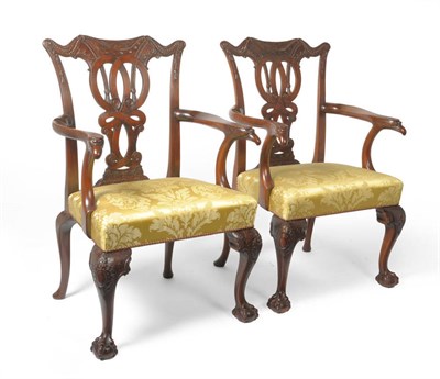 Lot 1692 - A Pair of George II Style Mahogany Carver Chairs, 20th century, the carved top rails above C scroll