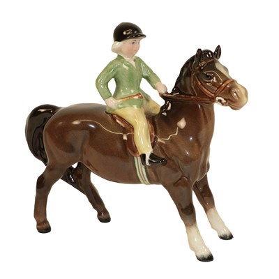 Lot 121 - Beswick Girl on Pony, model No. 1499, brown gloss (a.f)