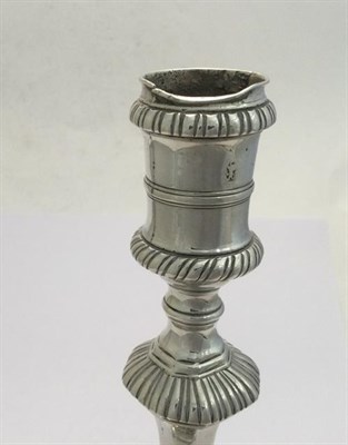 Lot 2013 - A Pair of George III Silver Candlesticks, Maker's Mark WT, London, 1774, each on stepped square...