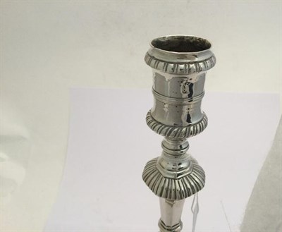 Lot 2013 - A Pair of George III Silver Candlesticks, Maker's Mark WT, London, 1774, each on stepped square...