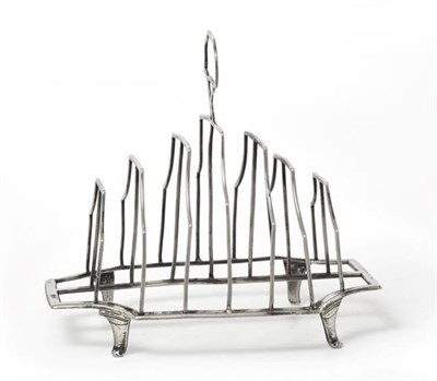 Lot 2022 - A George III Silver Toast-Rack, by Michael Plummer, London, 1792, shaped oblong and on four...