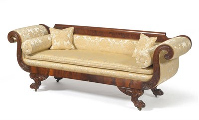 Lot 1698 - A William IV Carved Mahogany Scroll End Settee, 2nd quarter 19th century, upholstered in modern...