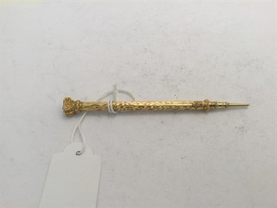 Lot 2057 - A Victorian Gold Propelling-Pencil, by Sampson Mordan and Co. Circa 1880, cylindrical, with foliage