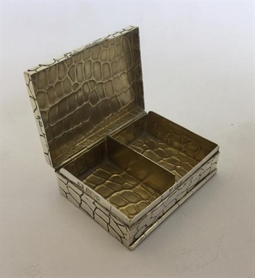 Lot 2060 - An Edward VII Silver Box, by Lawrence Emanuel, Birmingham, 1901, oblong and with textured...