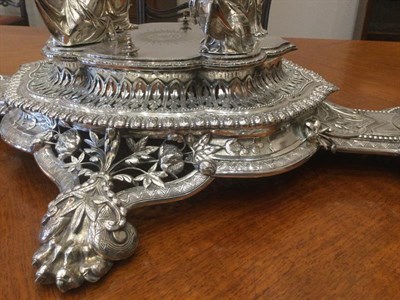 Lot 2063 - A Victorian Silver Plate Centrepiece, by Elkington and Co., Birmingham, 1875, oval, the centre with